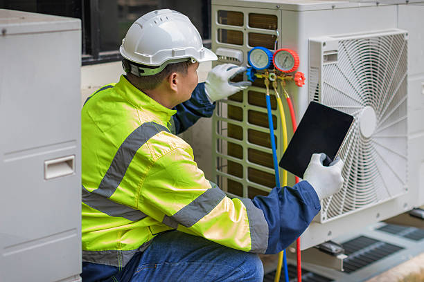 Professional Air Duct Cleaning technician working in Fenton, IA